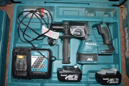 Makita 18v cordless hammer drill c/w 2 batteries, charger & carry case A636443