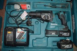 Makita 18v cordless hammer drill c/w 2 batteries, charger & carry case A599209