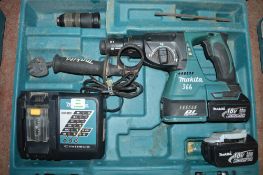 Makita 18v cordless hammer drill c/w 2 batteries, charger & carry case A599280
