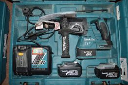 Makita 18v cordless hammer drill c/w 2 batteries, charger & carry case A636456