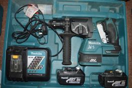 Makita 18v cordless hammer drill c/w 2 batteries, charger & carry case A636467