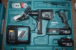 Makita 18v cordless hammer drill c/w 2 batteries, charger & carry case A605536