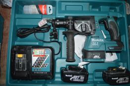 Makita 18v cordless hammer drill c/w 2 batteries, charger & carry case A636460