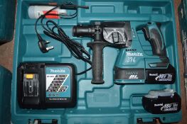 Makita 18v cordless hammer drill c/w 2 batteries, charger & carry case A636520