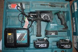 Makita 18v cordless hammer drill c/w 2 batteries, charger & carry case A636487