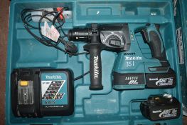 Makita 18v cordless hammer drill c/w 2 batteries, charger & carry case A636483
