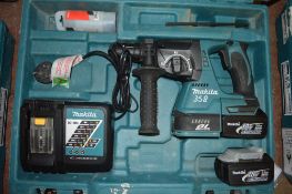 Makita 18v cordless hammer drill c/w 2 batteries, charger & carry case A636502