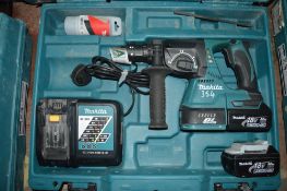 Makita 18v cordless hammer drill c/w 2 batteries, charger & carry case A611338