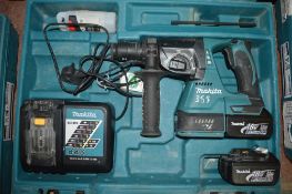 Makita 18v cordless hammer drill c/w 2 batteries, charger & carry case A616497