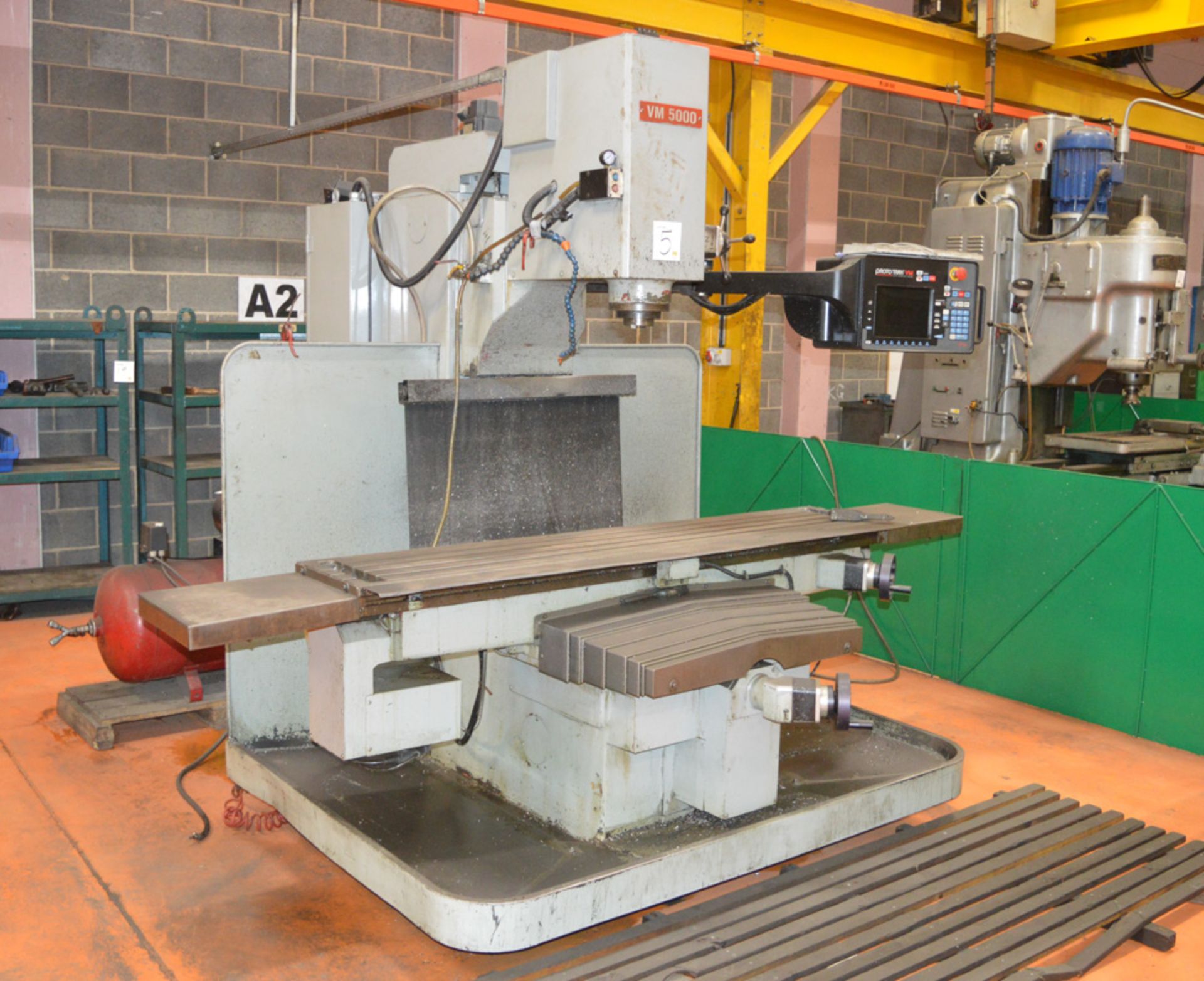 XYZ VM5000 CNC vertical milling machine Year: 2003 S/N: 9869 c/w 1930mm by 360mm slotted table &