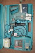 Makita 24v cordless rotary hammer drill c/w 2 batteries, charger & carry case E0002496