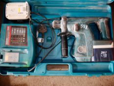 Makita 24v cordless hammer drill c/w 2 batteries, charger & carry case E0004889