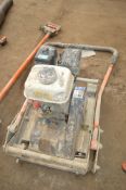 Belle petrol driven concrete screed