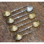 An Elizabeth II set of seven silver Coronation coffee spoons, Birmingham 1952, 79 grams/2.