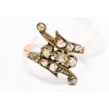 An 18ct gold ring set with rose cut diamonds, ring size O½,