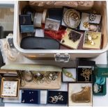 A carry case containing a qty of assorted costume jewellery,