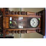 A late 19th Century German mahogany wall clock with Roman numerals