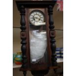 A Victorian Vienna wall clock, with pendulum and key, gilt inner and out chapter dials,