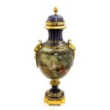 A large Continental pedestal vase, transfer decorated with loving couple to one side,