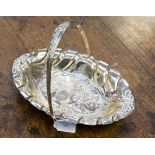 A Victorian silver oval cake basket, embossed with chrysanthemums, Henry Wilkinson & Co,