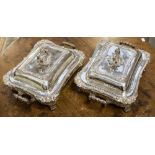 A pair of George III silver entree dishes in Old Sheffield Plate twin handled stands,