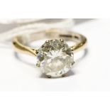 A diamond solitaire 18ct white gold ring, the round brilliant cut diamond approximately 3.