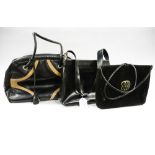 A Russell and Bromley leather bag with caramel coloured leather inserts in black with two handles