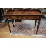 An early Victorian mahogany serving table, fitted with two drawers,