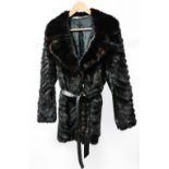 A ladies black/brown Mink jacket, the pelts in a chevron pattern,