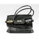 A large black Birkin style Buffalo leather bag in black with shoulder strap and metal fastener,