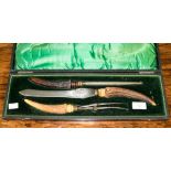 A cased Martin and Hall three piece antler handle carving set