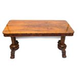 A George IV rosewood twin pedestal library table, the top with book-matched veneers,