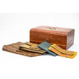 A portable writing slope, crocodile pattern imprinted to leather exterior,