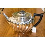 A Victorian silver tea pot, maker Edward Hutton (Wm.