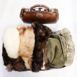 A brown leather Gladstone bag, together with a fur muff,