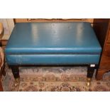 An early 20th Century stool, upholstered in blue leatherette,