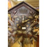 A 20th Century black forest wall hanging cuckoo clock,