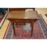 A late Victorian aesthetic mahogany writing table, fitted with a single drawer,
