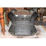 A pair of Aesthetic mart black cast iron garden planters, of octagonal form,