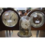 A Smiths Enfield dome topped mantle clock, with another domed top mantle clock,