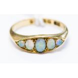 An 18ct gold opal five stone ring, 3.