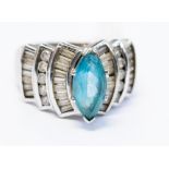 A 9ct white gold diamond and blue topaz dress ring,