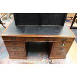 A George III mahogany pedestal partners desk, one side with three drawers to top,