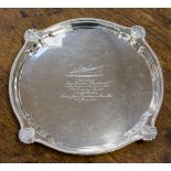 A silver salver, raised on four feet, maker Roberts & Belk, Sheffield 1926, approx 33.