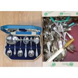 A collection of various silver plated cutlery,