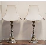 Pair of filled silver lamp bases, W.I.