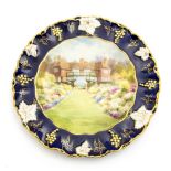 A Royal Crown Derby painted plate, decorated by J Price with an image of Cloud Wood house,