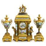 A French gilt metal and porcelain clock garniture,