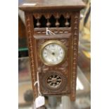 A French dolls house clock circa 1920 with scout time piece,