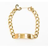 A 9ct gold identity bracelet, 'Michael' engraved to plate, weight approx 30.